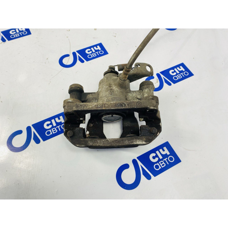 Суппорт тормозной задний левый Renault Master 3 (Opel Movano) 2010-